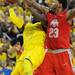 Michigan junior Tim Hardaway Jr. is blocked by Ohio State sophomore Amir WIlliams during the second half at Crisler Center on Tuesday, Feb. 5. Melanie Maxwell I AnnArbor.com